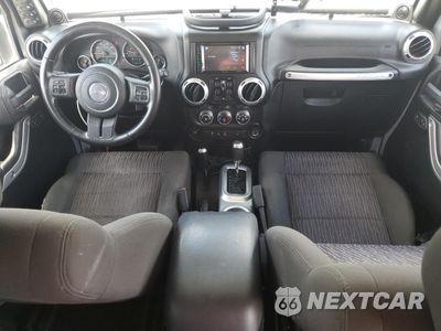 Zdjęcie 8 z 12 samochodu: 2011 JEEP WRANGLER UNLIMITED SAHARA VIN:1J4BA5H17BL572694 - miniatura