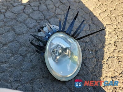 Zdjęcie 12 z 13 samochodu: 2003 VOLKSWAGEN NEW BEETLE GLS VIN:3VWCD21C73M404689 - miniatura