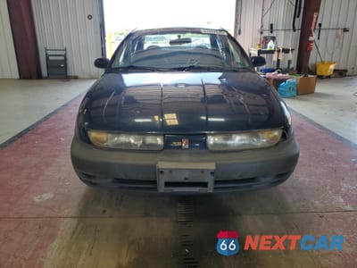 Piąte zdjęcie samochodu w środku: 1999 SATURN SL1 VIN:1G8ZH5288XZ178819 - miniatura