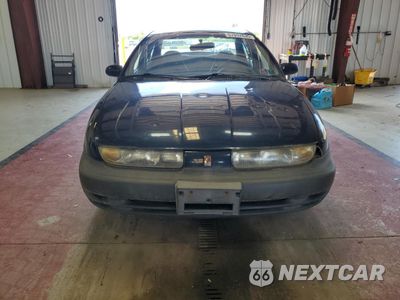 Piąte zdjęcie samochodu w środku: 1999 SATURN SL1 VIN:1G8ZH5288XZ178819 - miniatura