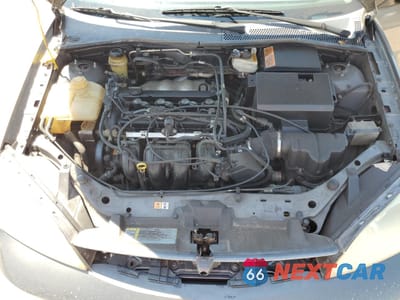 Zdjęcie 11 z 14 samochodu: 2005 FORD FOCUS ZX4 VIN:1FAFP34N35W112850 - miniatura