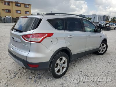 Trzecie zdjęcie samochodu z tyłu: 2016 FORD ESCAPE SE VIN:1FMCU0GX2GUC73606 - miniatura