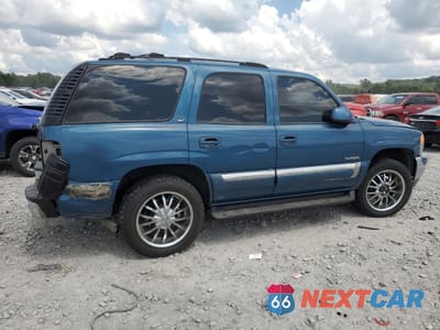Trzecie zdjęcie samochodu z tyłu: 2001 GMC YUKON VIN:1GKEK13VX1R167769 - miniatura