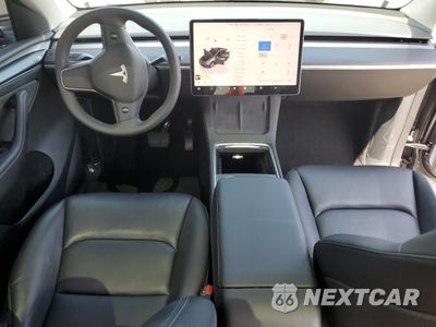 Zdjęcie 8 z 14 samochodu: 2023 TESLA MODEL Y VIN:7SAYGDEE8PF699998 - miniatura