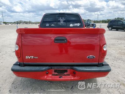 Zdjęcie 6 z 12 samochodu: 2003 FORD F150 SVT LIGHTNING VIN:2FTRF07313CA87359 - miniatura