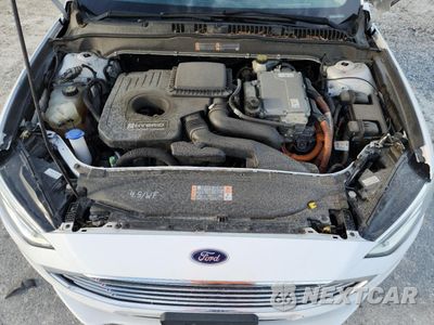 Zdjęcie 11 z 12 samochodu: 2017 FORD FUSION SE HYBRID VIN:3FA6P0LU7HR409408 - miniatura