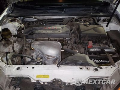 Zdjęcie 11 z 12 samochodu: 2003 TOYOTA CAMRY LE VIN:4T1BE32K43U154133 - miniatura