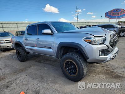 Czwarte zdjęcie samochodu z boku: 2017 TOYOTA TACOMA DOUBLE CAB VIN:5TFCZ5AN8HX065546 - miniatura