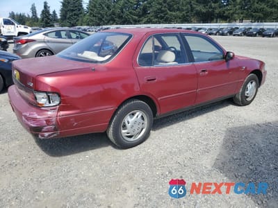 Trzecie zdjęcie samochodu z tyłu: 1994 TOYOTA CAMRY LE VIN:JT2SK12E1R0262410 - miniatura