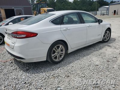 Trzecie zdjęcie samochodu z tyłu: 2018 FORD FUSION SE HYBRID VIN:3FA6P0LUXJR172015 - miniatura