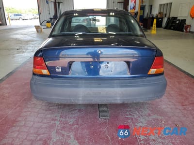 Zdjęcie 6 z 12 samochodu: 1999 SATURN SL1 VIN:1G8ZH5288XZ178819 - miniatura