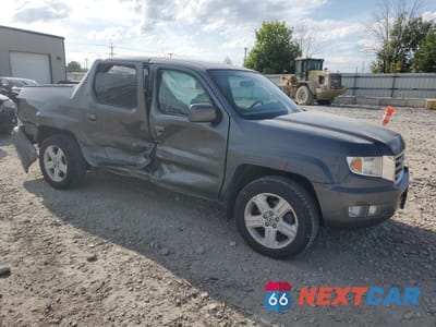 Czwarte zdjęcie samochodu z boku: 2012 HONDA RIDGELINE RTL VIN:5FPYK1F53CB001940 - miniatura