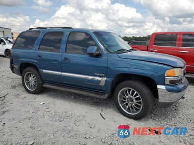 Czwarte zdjęcie samochodu z boku: 2001 GMC YUKON VIN:1GKEK13VX1R167769 - miniatura