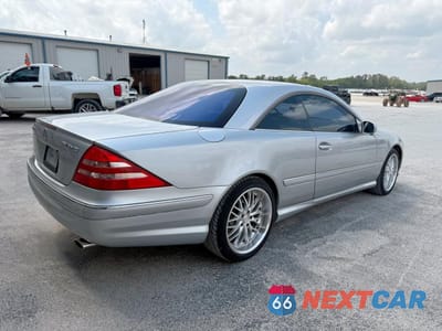 Czwarte zdjęcie samochodu z boku: 2002 MERCEDES-BENZ CL 500 VIN:WDBPJ75J02A022095 - miniatura