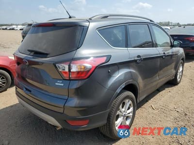 Trzecie zdjęcie samochodu z tyłu: 2018 FORD ESCAPE SE VIN:1FMCU0GD2JUD01448 - miniatura