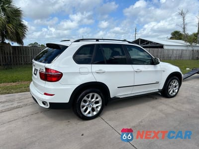 Czwarte zdjęcie samochodu z boku: 2013 BMW X5 XDRIVE35I VIN:5UXZV4C50D0B01442 - miniatura