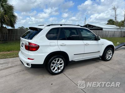 Czwarte zdjęcie samochodu z boku: 2013 BMW X5 XDRIVE35I VIN:5UXZV4C50D0B01442 - miniatura