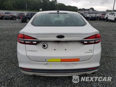 Zdjęcie 6 z 12 samochodu: 2017 FORD FUSION SE HYBRID VIN:3FA6P0LU3HR359543 - miniatura