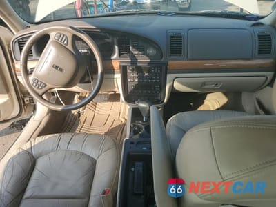 Zdjęcie 8 z 14 samochodu: 2002 LINCOLN CONTINENTAL VIN:1LNHM97V42Y619021 - miniatura