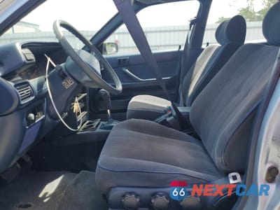 Zdjęcie 7 z 12 samochodu: 1991 TOYOTA CAMRY DLX VIN:JT2SV21W9M0379281 - miniatura