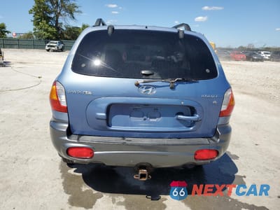 Zdjęcie 6 z 15 samochodu: 2002 HYUNDAI SANTA FE GLS VIN:KM8SC13D92U218496 - miniatura