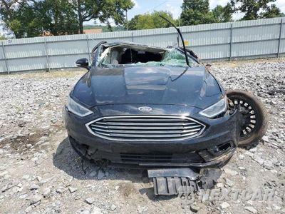 Piąte zdjęcie samochodu w środku: 2017 FORD FUSION TITANIUM HEV VIN:3FA6P0RUXHR368876 - miniatura