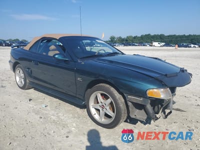 Czwarte zdjęcie samochodu z boku: 1994 FORD MUSTANG GT VIN:1FALP45T6RF202120 - miniatura