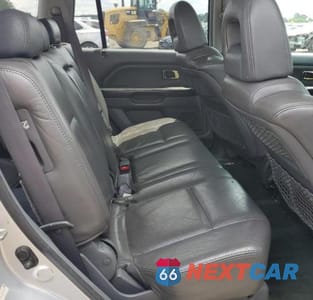 Zdjęcie 11 z 13 samochodu: 2004 HONDA PILOT EXL VIN:2HKYF18794H532770 - miniatura