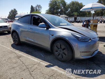 Czwarte zdjęcie samochodu z boku: 2024 TESLA MODEL Y VIN:7SAYGAEE4RF125173 - miniatura