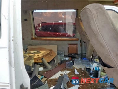 Zdjęcie 11 z 13 samochodu: 1999 CHEVROLET EXPRESS G1500 VIN:1GBFG15R6X1123300 - miniatura