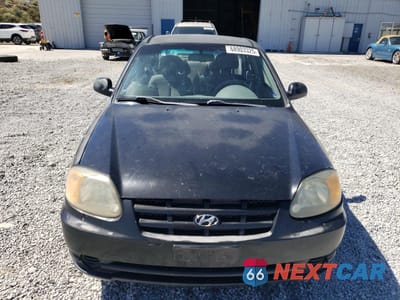 Piąte zdjęcie samochodu w środku: 2003 HYUNDAI ACCENT GL VIN:KMHCG45C43U465134 - miniatura