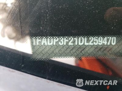 Zdjęcie 12 z 14 samochodu: 2013 FORD FOCUS SE VIN:1FADP3F21DL259470 - miniatura