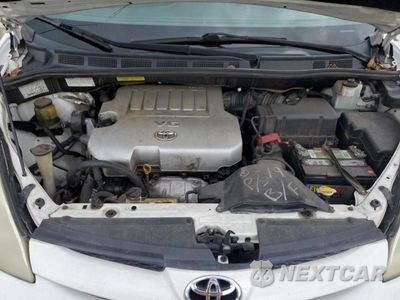 Zdjęcie 12 z 13 samochodu: 2010 TOYOTA SIENNA CE VIN:5TDKK4CC1AS311886 - miniatura