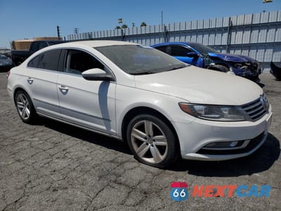 Czwarte zdjęcie samochodu z boku: 2014 VOLKSWAGEN CC SPORT VIN:WVWBP7AN6EE524108 - miniatura