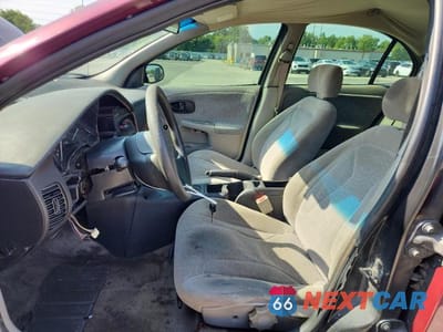 Zdjęcie 7 z 13 samochodu: 2002 SATURN SL1 VIN:1G8ZH52842Z312766 - miniatura