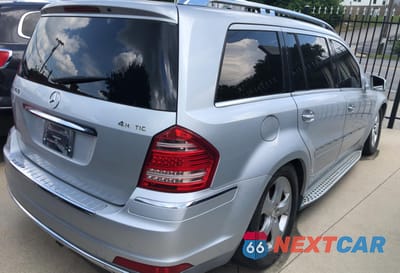 Czwarte zdjęcie samochodu z boku: 2011 MERCEDES-BENZ GL 450 4MATIC VIN:4JGBF7BEXBA672438 - miniatura
