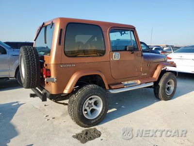 Trzecie zdjęcie samochodu z tyłu: 1987 JEEP WRANGLER LAREDO VIN:2BCCL8143HB514067 - miniatura