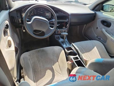 Zdjęcie 8 z 13 samochodu: 2002 SATURN SL1 VIN:1G8ZH52842Z312766 - miniatura