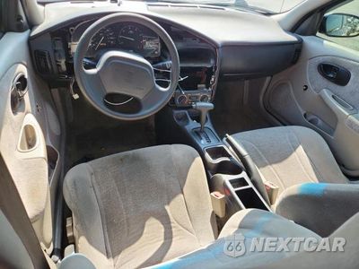 Zdjęcie 8 z 13 samochodu: 2002 SATURN SL1 VIN:1G8ZH52842Z312766 - miniatura