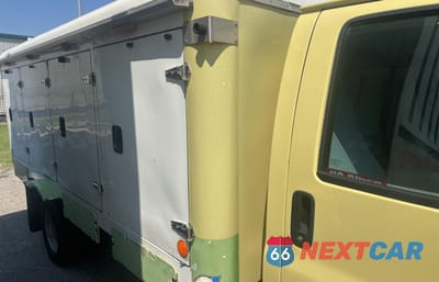 Zdjęcie 6 z 11 samochodu: 2014 GMC SAVANA CUTAWAY G4500 VIN:1GD675CB2E1167134 - miniatura