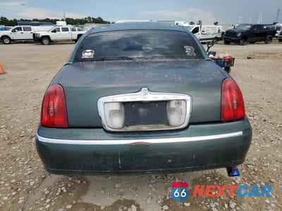 Zdjęcie 6 z 15 samochodu: 2000 LINCOLN TOWN CAR EXECUTIVE VIN:1LNHM81W8YY820974 - miniatura