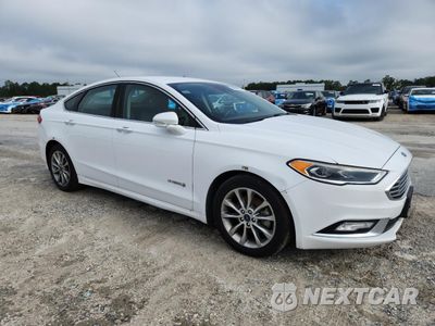 Czwarte zdjęcie samochodu z boku: 2017 FORD FUSION SE HYBRID VIN:3FA6P0LU4HR409236 - miniatura