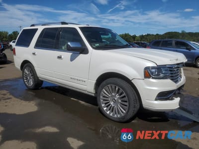 Czwarte zdjęcie samochodu z boku: 2015 LINCOLN NAVIGATOR VIN:5LMJJ2JT4FEJ07854 - miniatura
