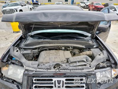 Zdjęcie 11 z 14 samochodu: 2008 HONDA RIDGELINE RT VIN:2HJYK16248H514643 - miniatura