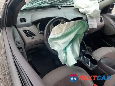 Zdjęcie 8 z 11 samochodu: 2012 HYUNDAI TUCSON GLS VIN:KM8JUCAC0CU472081 - miniatura