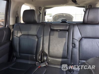 Zdjęcie 10 z 12 samochodu: 2014 HONDA PILOT TOURING VIN:5FNYF4H96EB009404 - miniatura