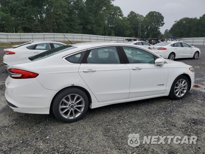 Trzecie zdjęcie samochodu z tyłu: 2017 FORD FUSION SE HYBRID VIN:3FA6P0LUXHR400699 - miniatura