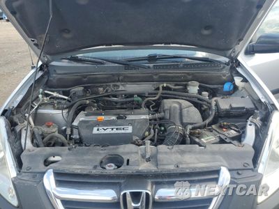 Zdjęcie 12 z 15 samochodu: 2004 HONDA CR-V LX VIN:JHLRD77564C026485 - miniatura