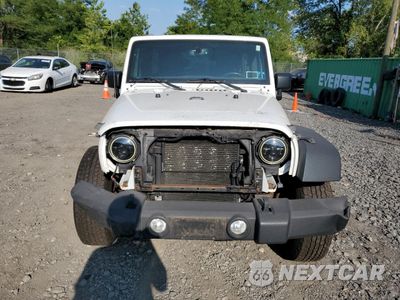 Piąte zdjęcie samochodu w środku: 2015 JEEP WRANGLER UNLIMITED SPORT VIN:1C4HJWDG4FL619900 - miniatura