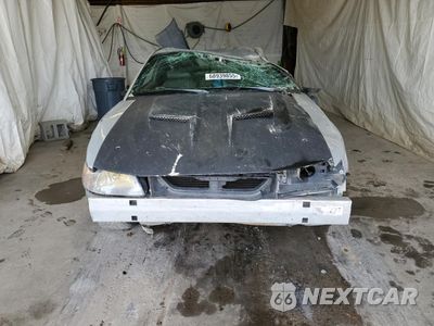 Piąte zdjęcie samochodu w środku: 1999 FORD MUSTANG VIN:1FAFP4047XF143234 - miniatura